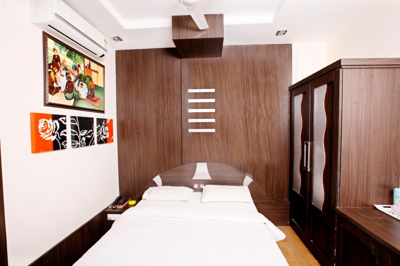 Hotel Vasantham Coimbatore Bagian luar foto
